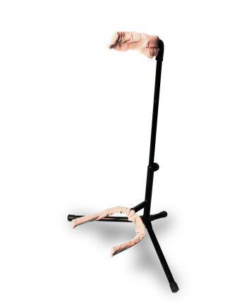Tan fur Axe Hugger on a stand.